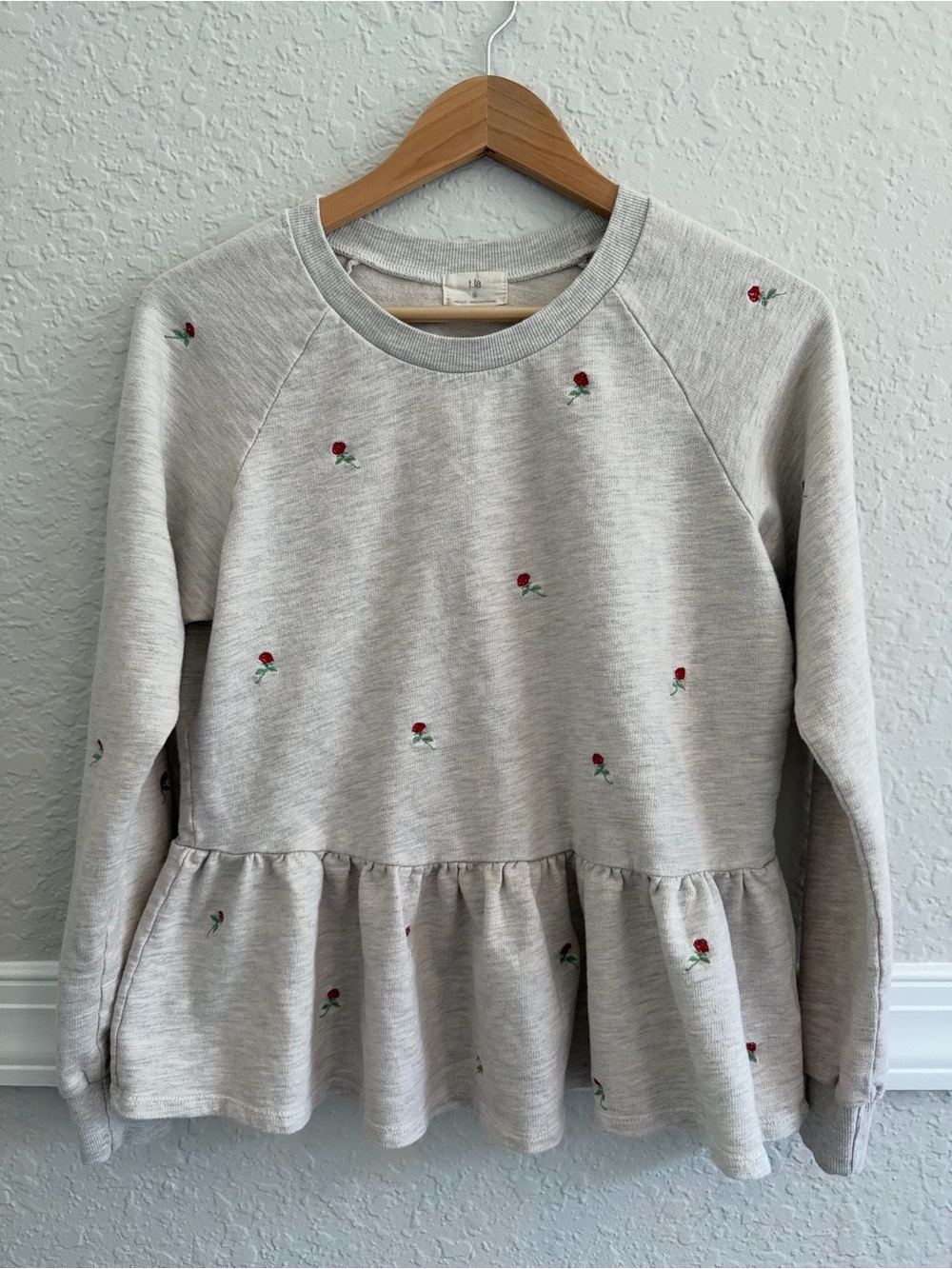 T.La Anthropologie Peplum Sweatshirt – Size Small – Gray with rose embroidery